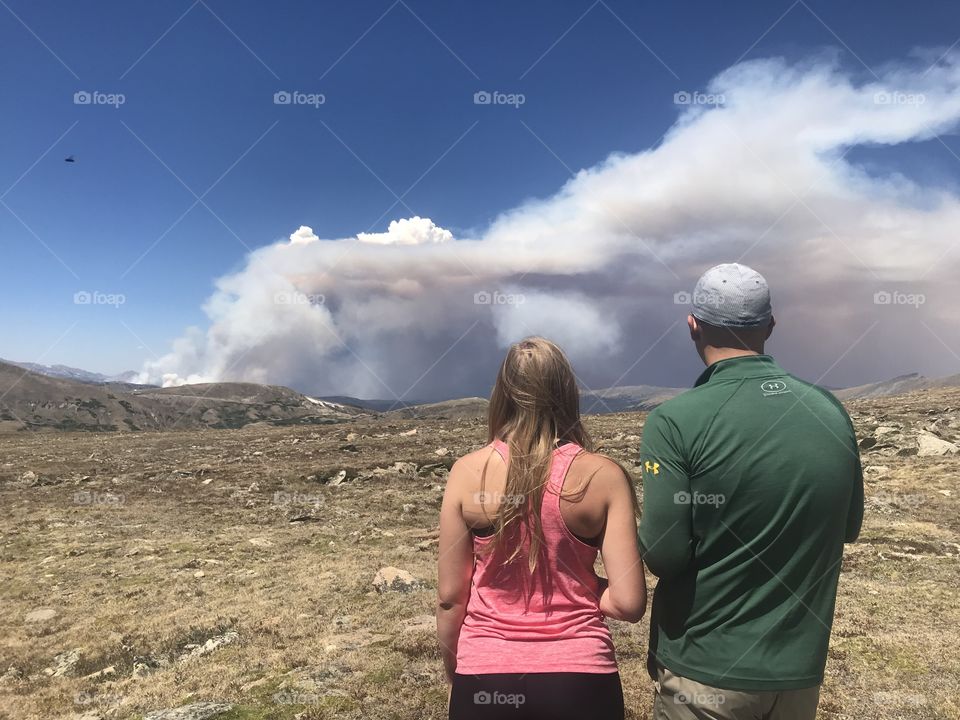 Witnessing a wildfire brewing nearby.  Photo was taken in Rocky Mountain National Park.  