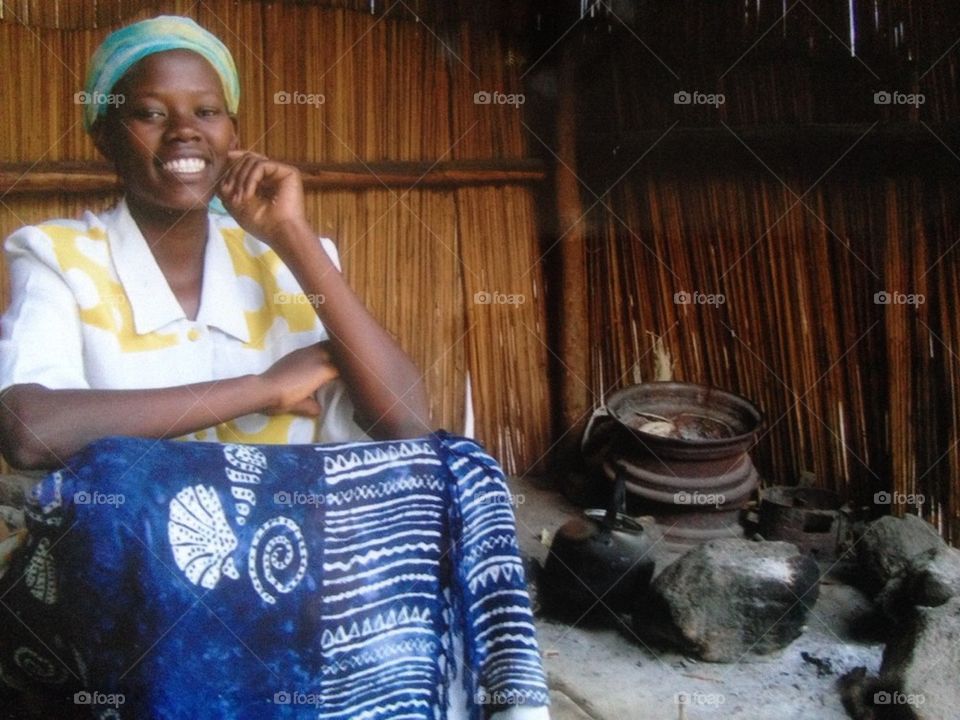 Young African Woman in Hut