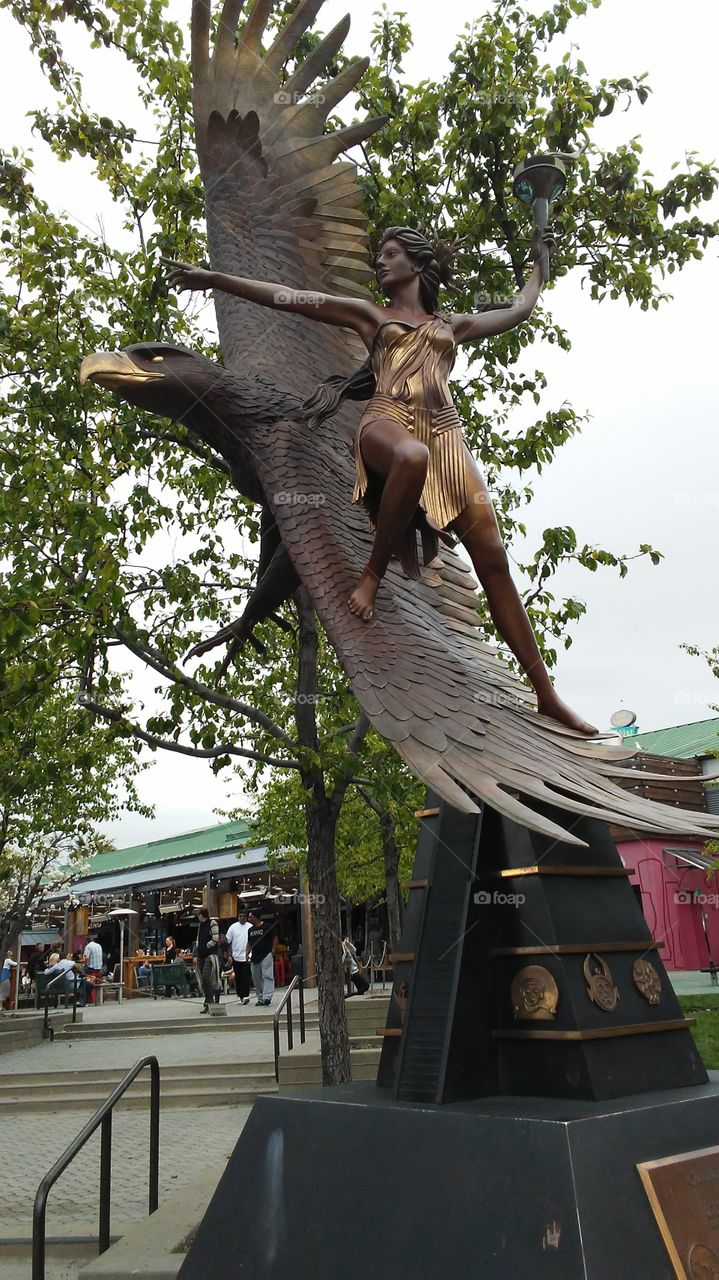 girl on eagle statue