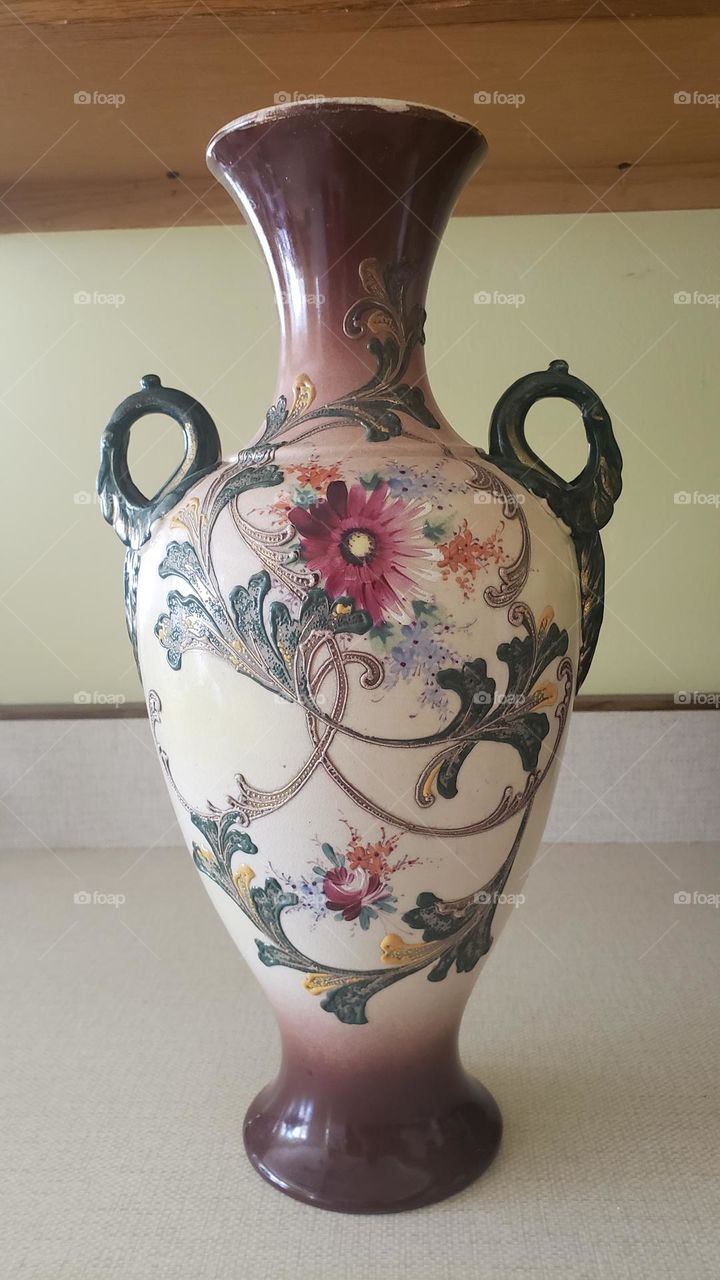 Double handled Hand painted antique vase. Japanese. Ceramic. Gold colored trim.  Fifteen inches tall.