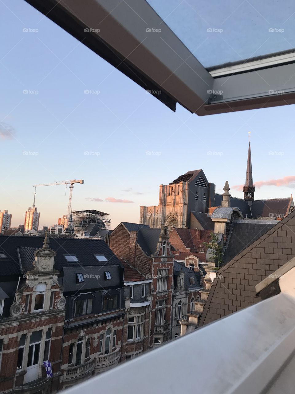I live in Leuven, a student city in Belgium. This is the view of the cathedral from my bedroom window. 
