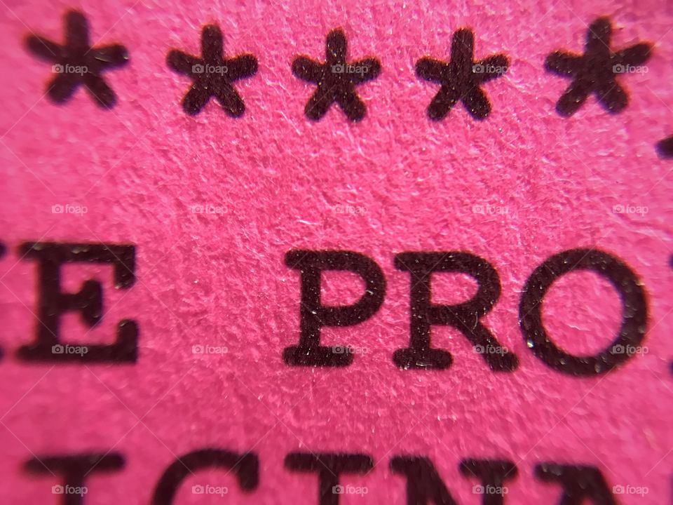 Close-up pink printed material
