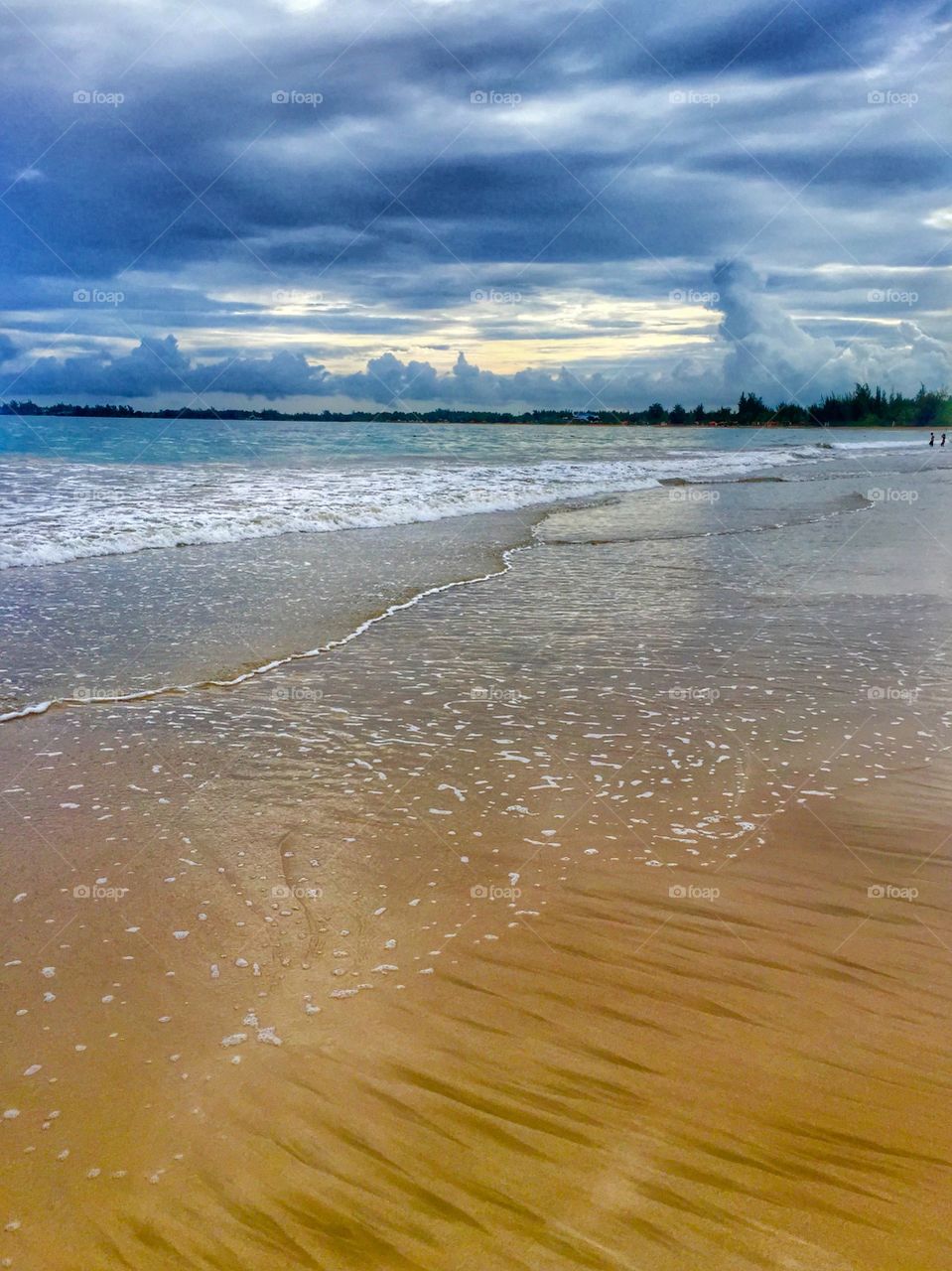 Brown sand beach and clouds on the sky in Puerto Rico