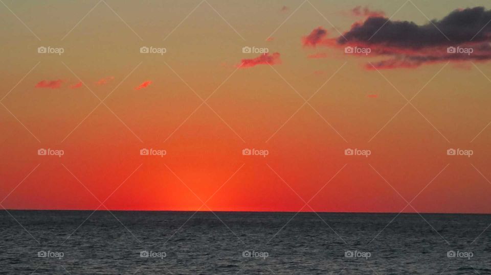 Bright sky against Lake Michigan horizon just after complete Sunset