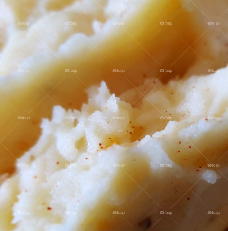 Texture of silky mashed potatoes drained well for dinner.