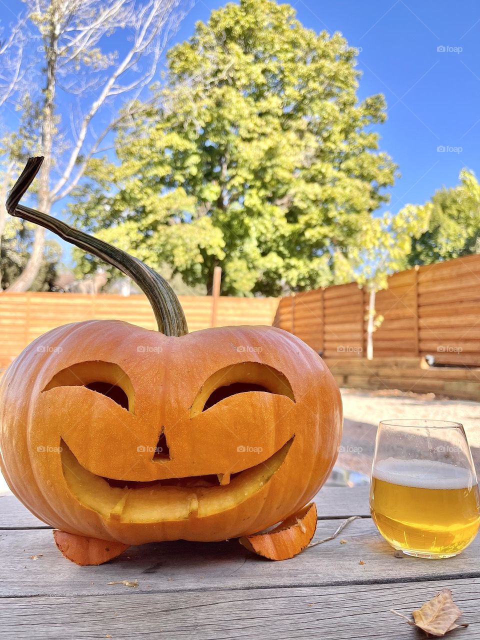 A happy pumpkin! Pumpkin carving accompanied by some crisp apple cider in October 