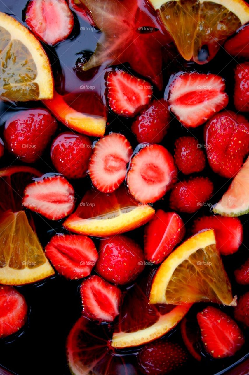 Drink made of bright fruits on the celebration table.