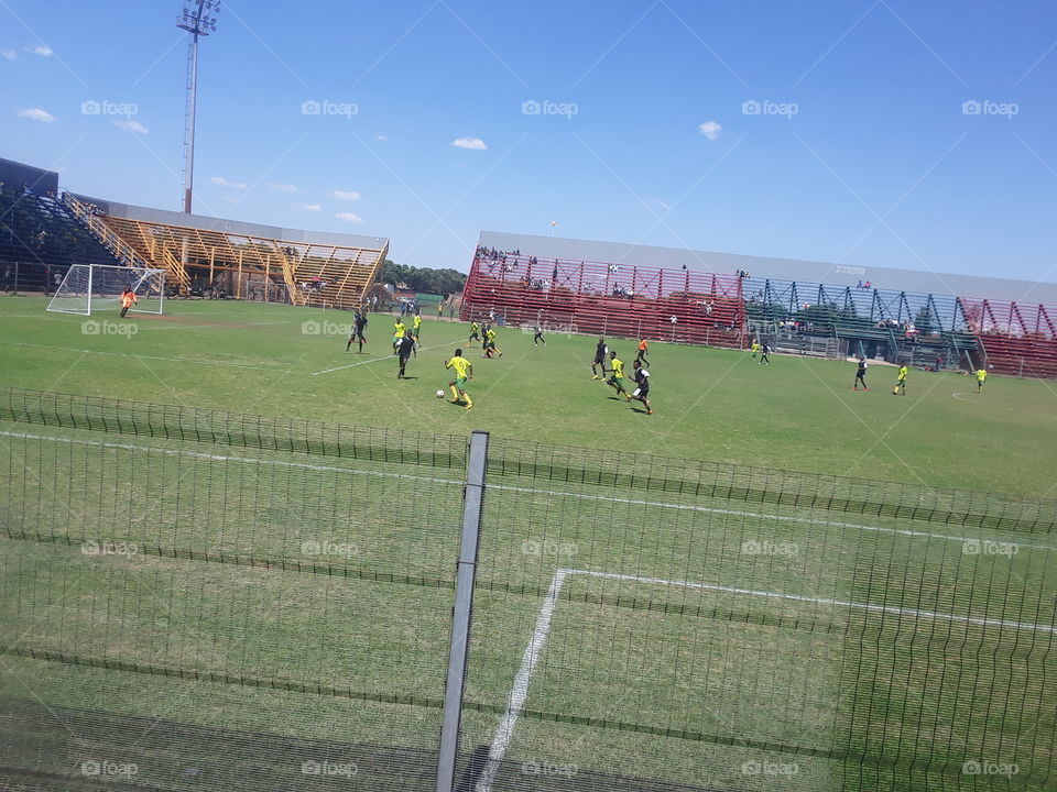 Football game under the hot sun.