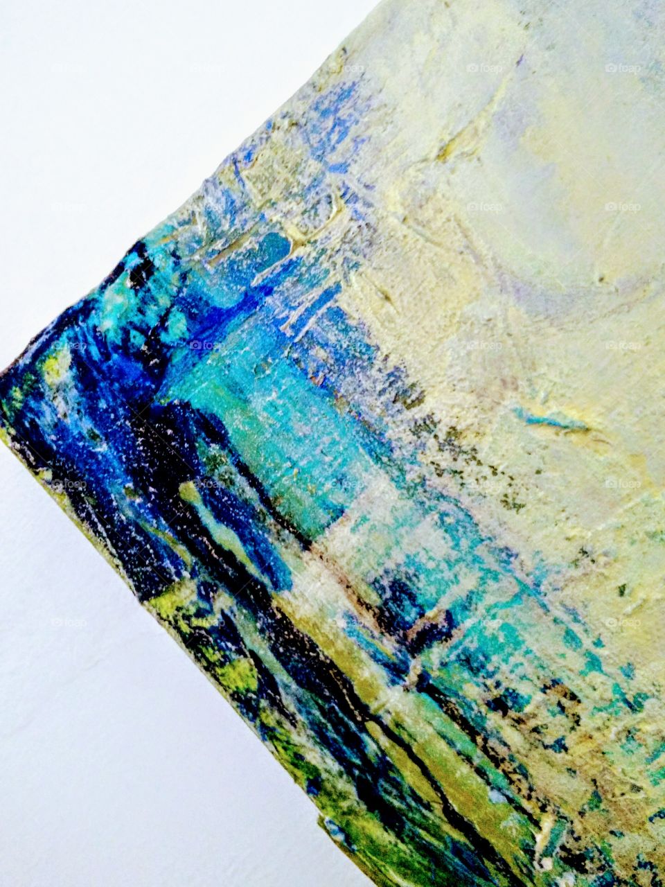 Abstract of layered blue hues paint taken on diagnonal