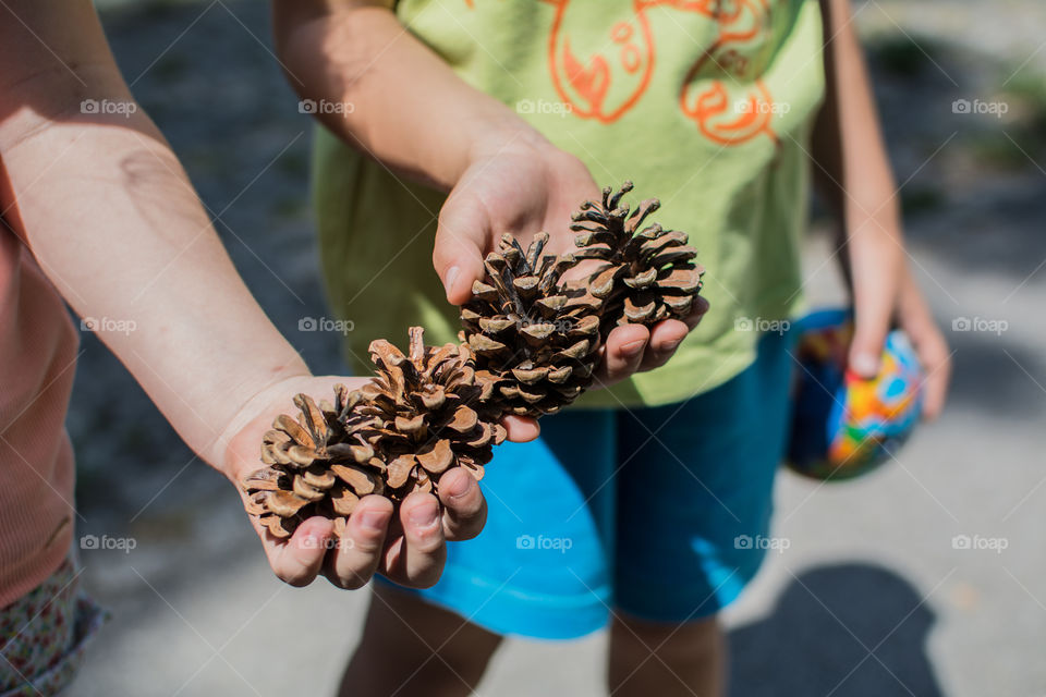 Children holding cones