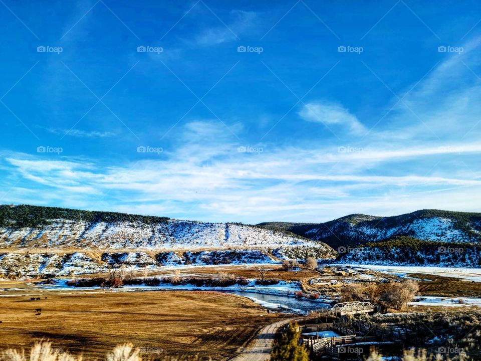 As I traveled through the Rocky Mountains, it was rare to see such a calm brisk morning as we head towards the foothills through the Arapahoe National Forrest.