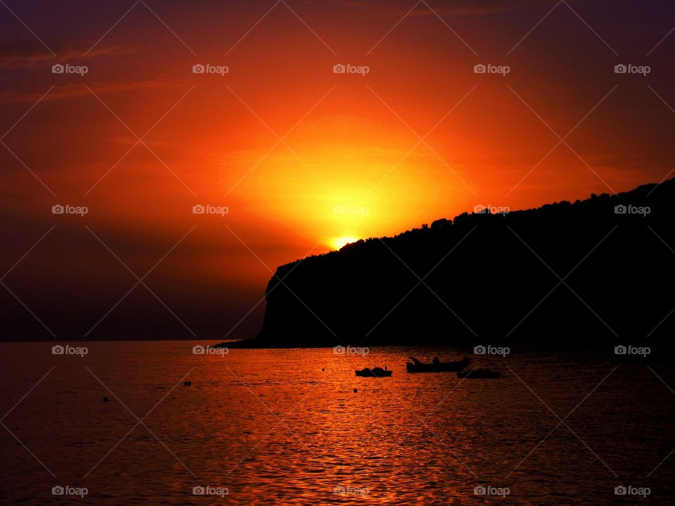 Silhouette of mountain during sunset