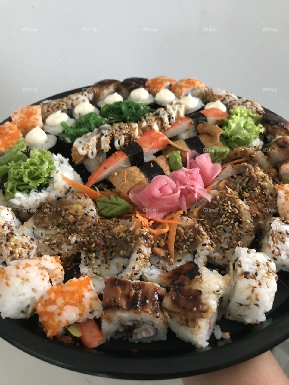 A plate of colorful sushi