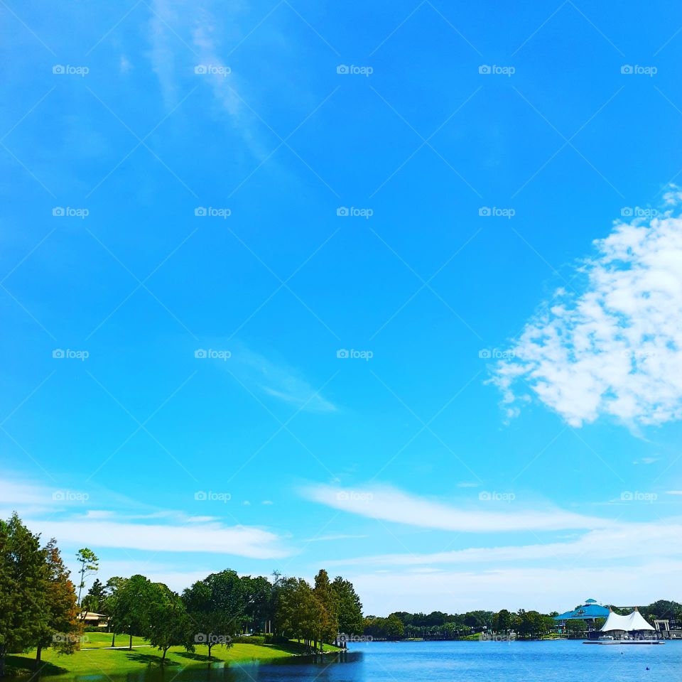 One of my favorite parks to go to, to walk around and take pictures is Cranes Roost Park. Blue sky, blue lake, and beautiful green trees.