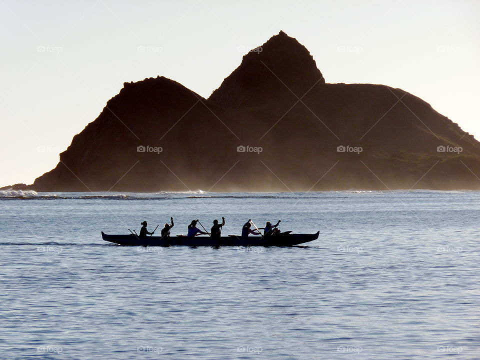Canoe paddlers off Lani Kai Oahu Hawaii