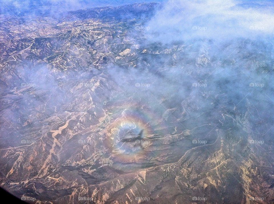 Rainbow below an airplane 