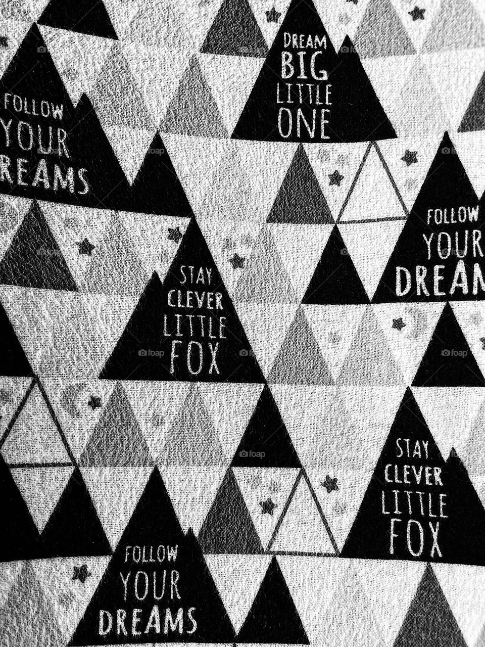 Geometric shapes in every day life, triangle pattern on child’s rocking chair, triangles on fabric, triangles in the pattern, geometric shapes in the household, triangle patterns