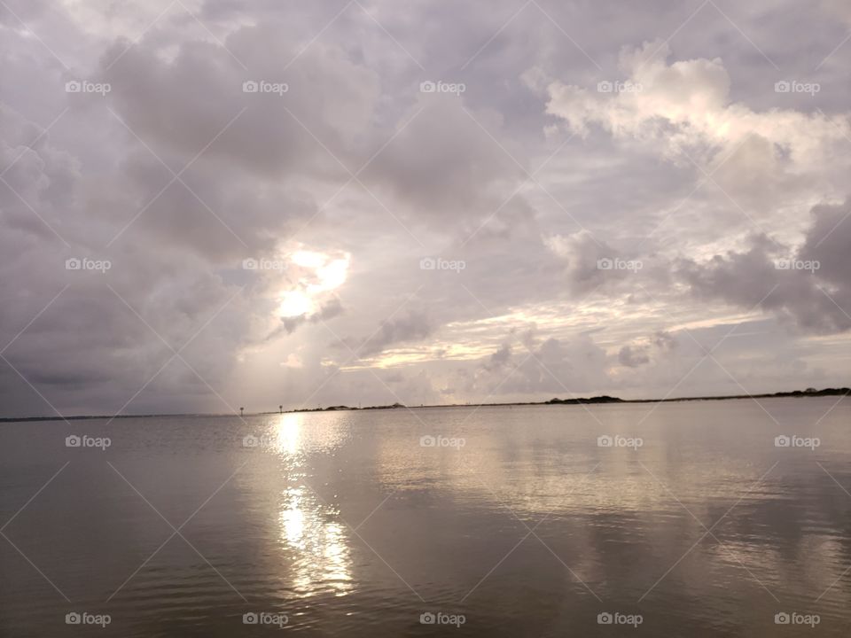 Sun shining onto the Florida water