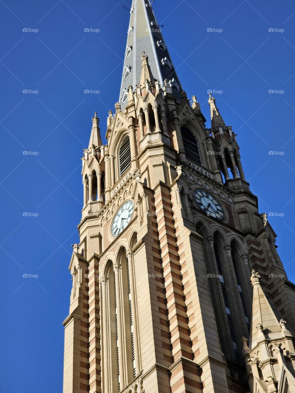 Tower and clock of the Cathedral of San Isidro stands tall and proud