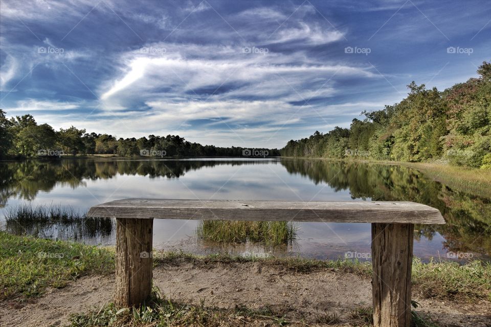 Empty table near lake