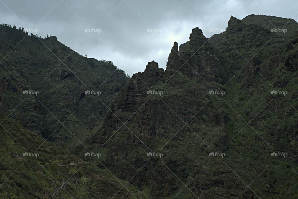 Hell's Gorge, a ravine punctuated by hundreds caves that were home to aboriginal Guanches. Tenerife, Canary Islands.