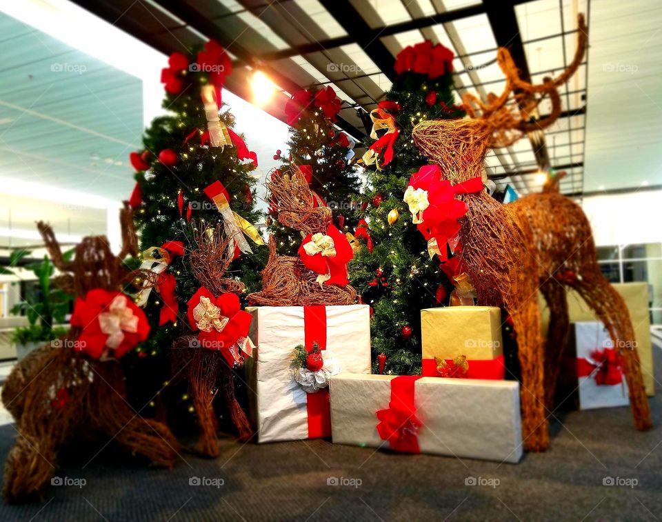 Christmas tree with reindeer and presents