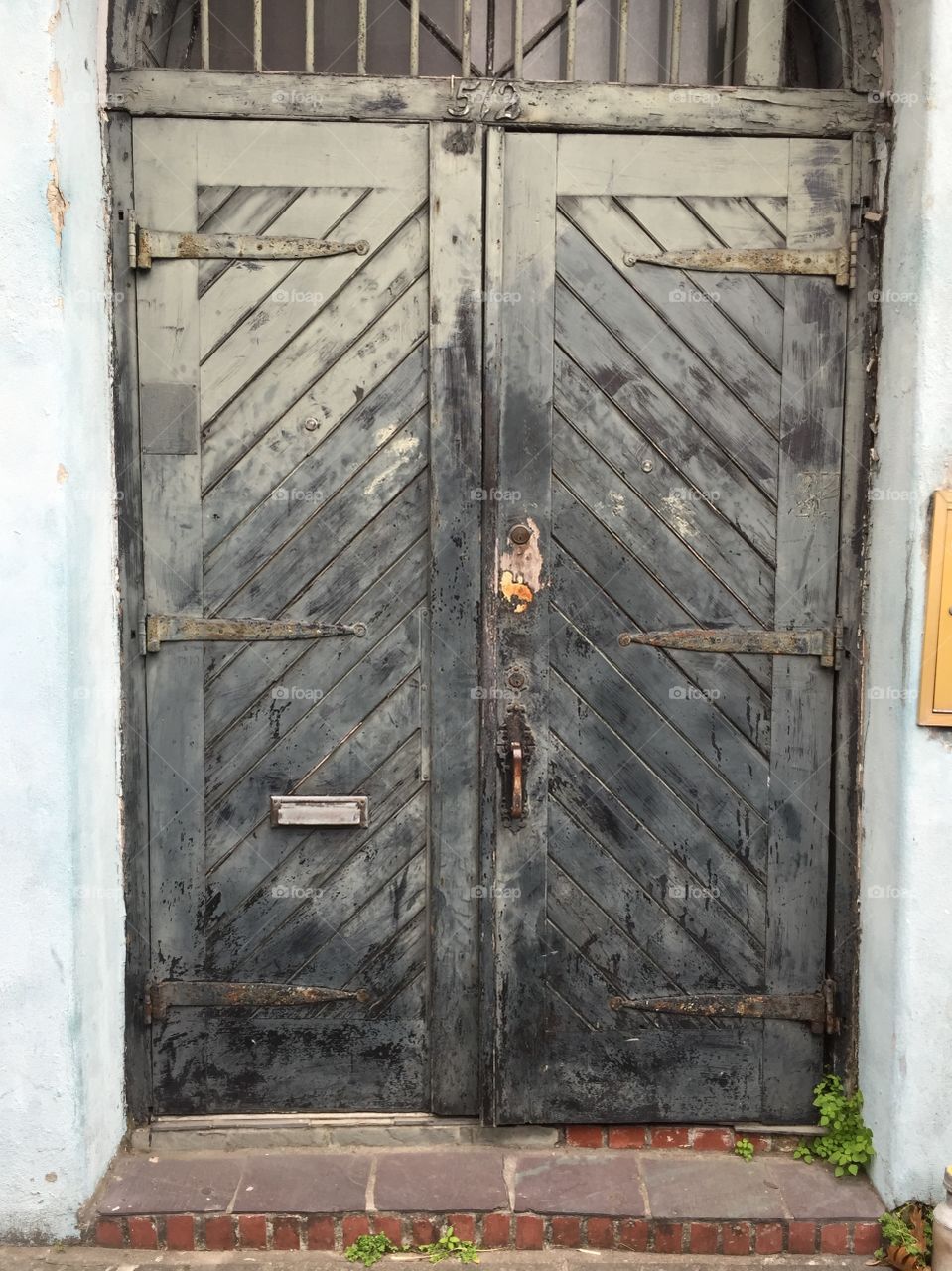 Beautifully weathered wooden door in New Orleans. 