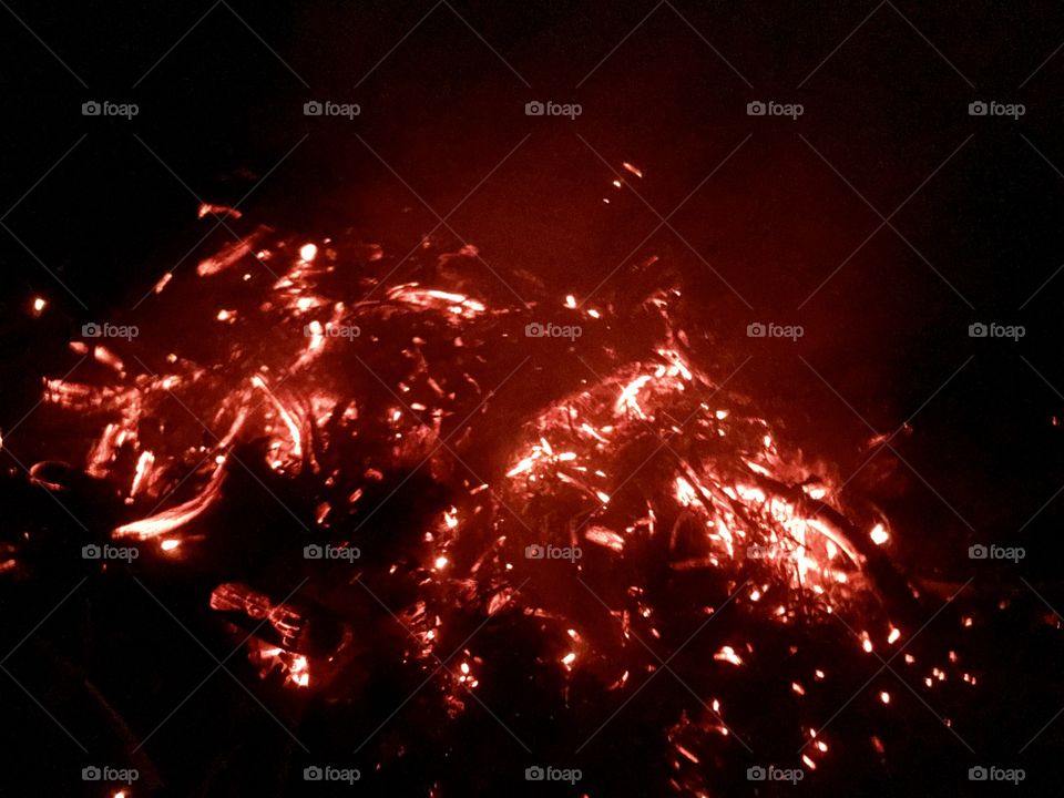 This is a shot of embers from a fire. Love the light in the picture. Gives it so much energy. 