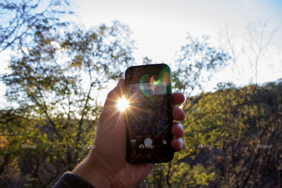 Golden Beam. A creative look at the golden hour when the cell phones come out many times.