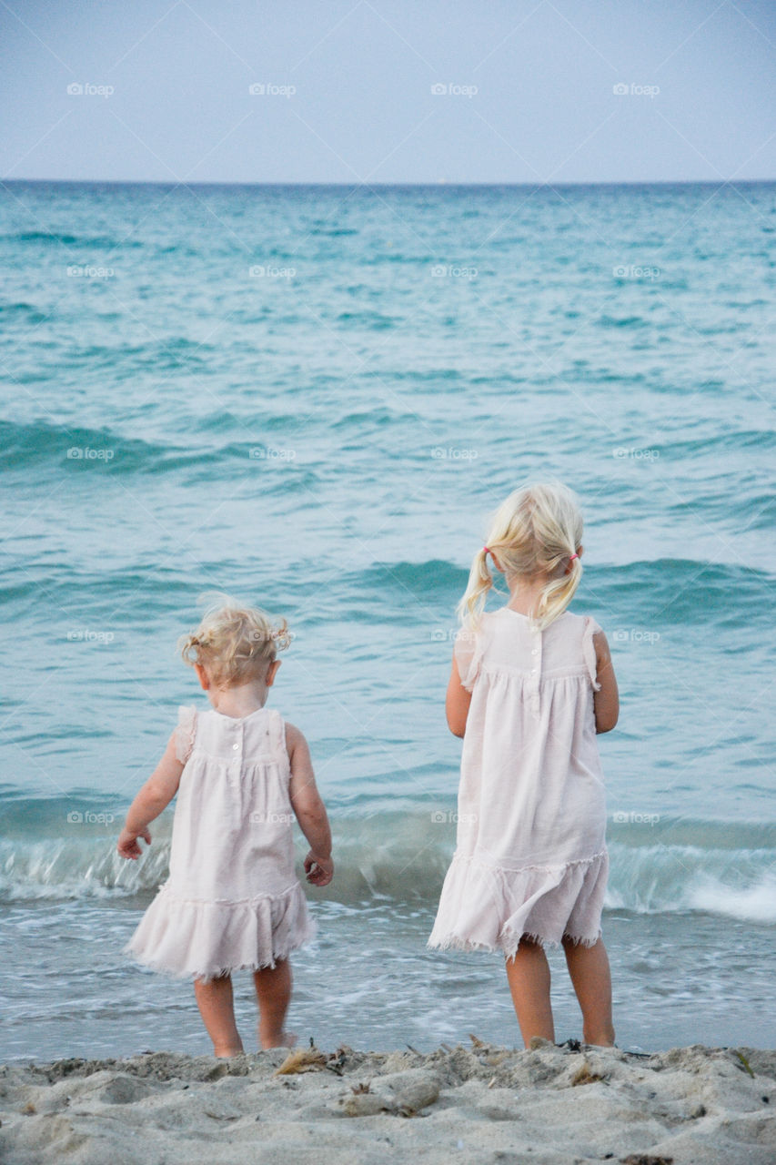 Two Swedish sisters is enjoying the beach on Majorca Spain.