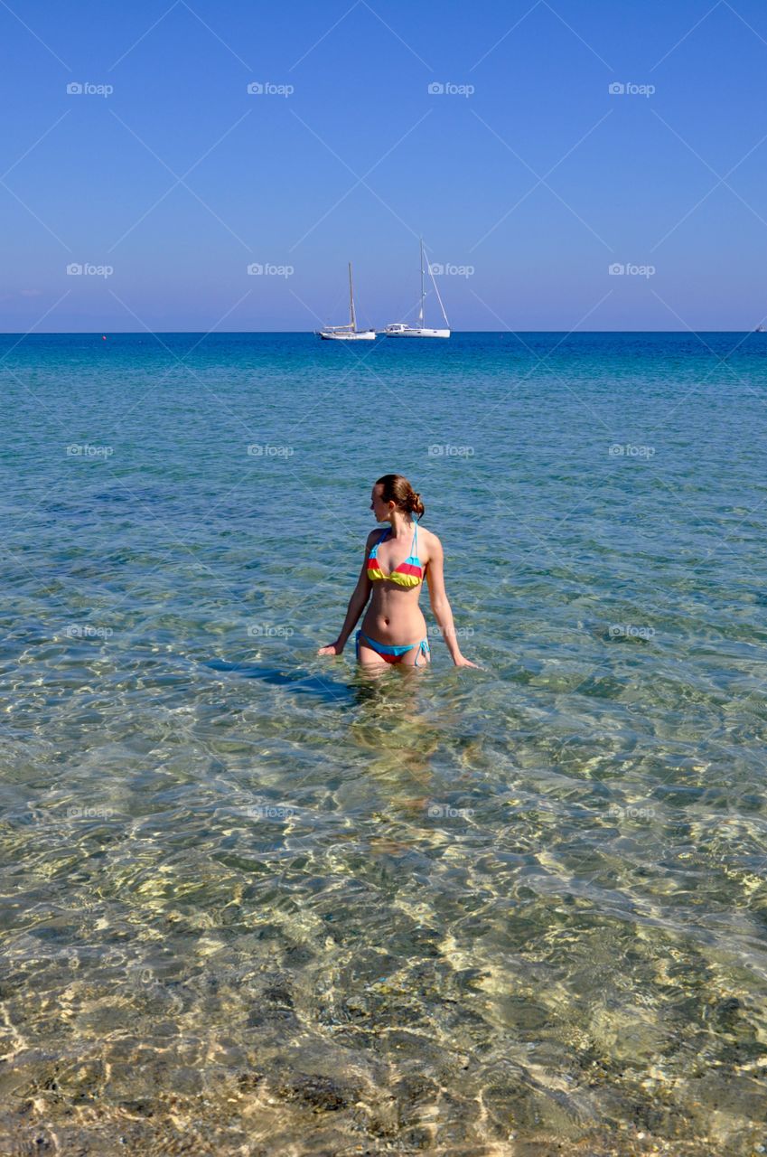 Swimming on Sardinia island Mediterranean Sea Italy 