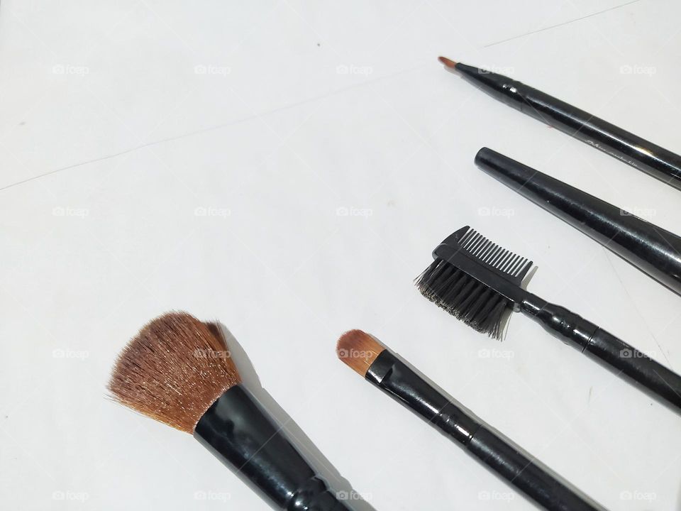 Makeup brushes isolated on white background