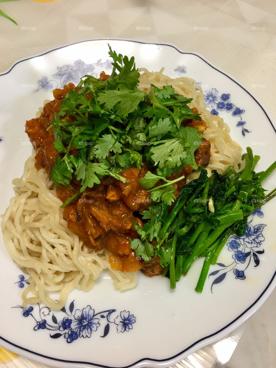 Homemade season curry with noodles and vegetables 