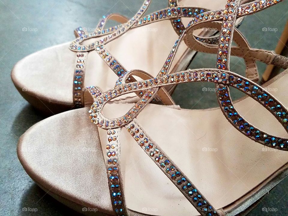 Close-up of woman's strapped shoes