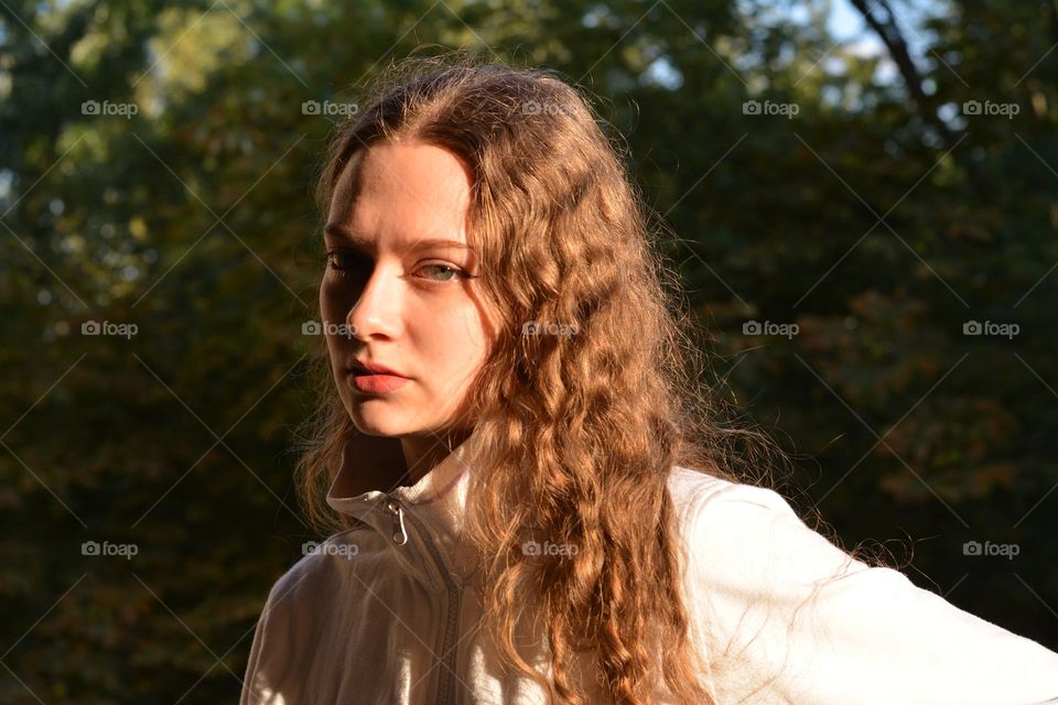 young girl beautiful portrait in sunlight