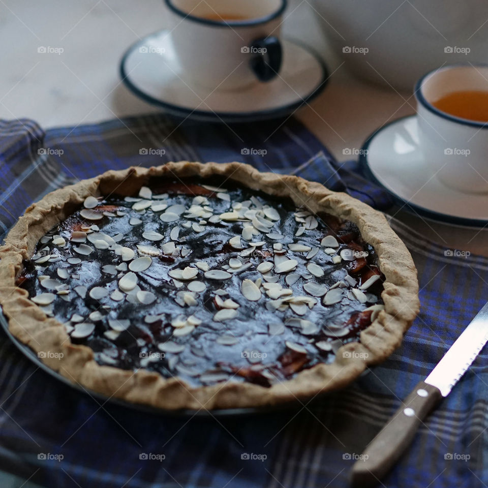 Plum pie with tea