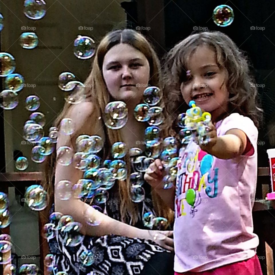 Birthdays and Bubbles. My niece playing with bubbles at her Birthday party