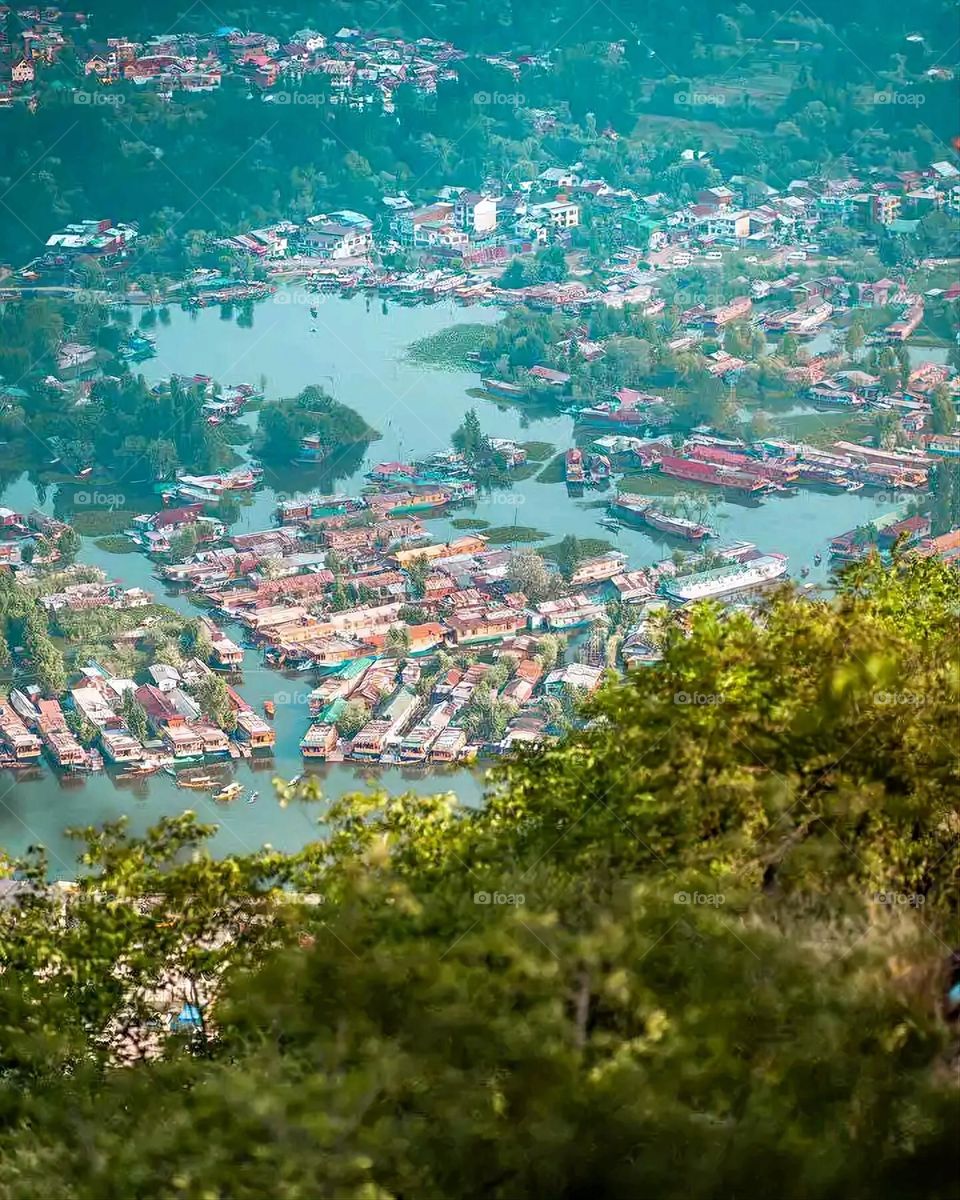 Glory be to God, the magnificent and picturesque view and the natural green trees are a view that is nothing more wonderful than it