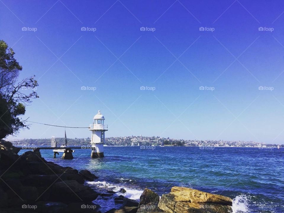 Sydney beautiful lighthouse by the blue sea