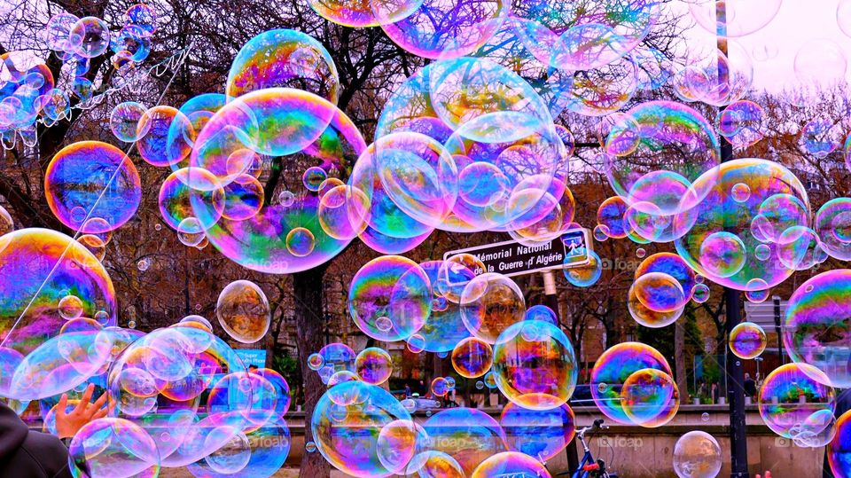 Colorful soap bubbles - soap water form a hollow sphere with an iridescent surface. Soap bubbles usually last for only a few moments and then burst either on their own or on contact with another object.