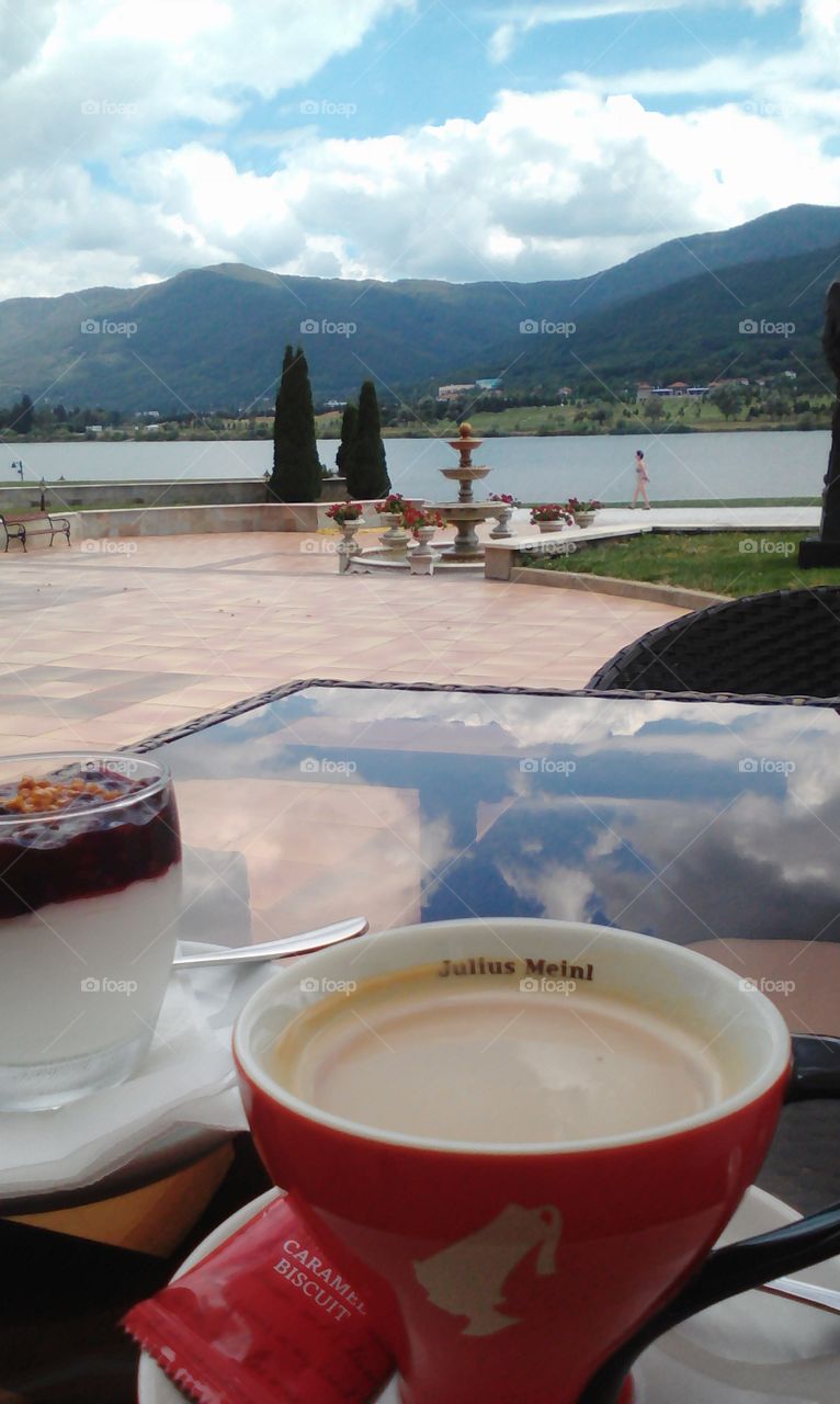 Coffee cup and nice view