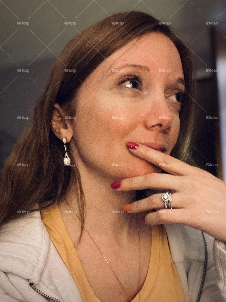 Wearing my favorite opal earrings and my wedding rings.