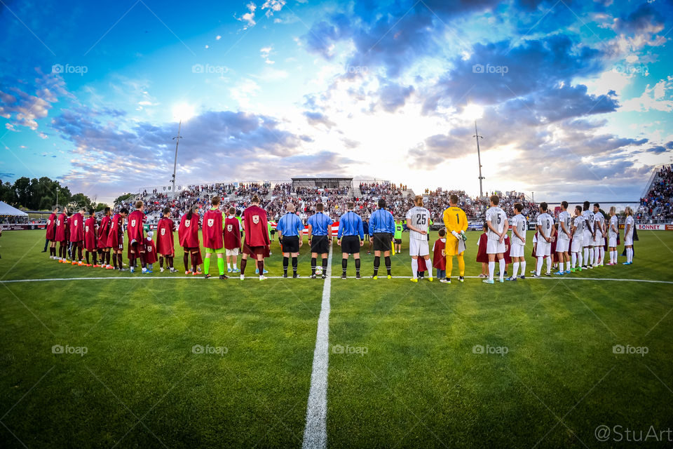 Sacramento Republic FC. The Sacramento Republic FC standing with their capes on for the Caped Crusader's game during the National Anthem 