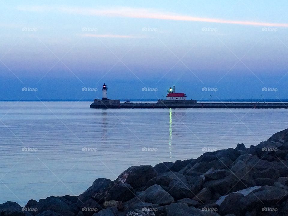 Duluth Harbor at Dusk. My favorite place. Sitting along the Lakewalk in Canal Park, watching the  colors change on the lake as the sun sets.