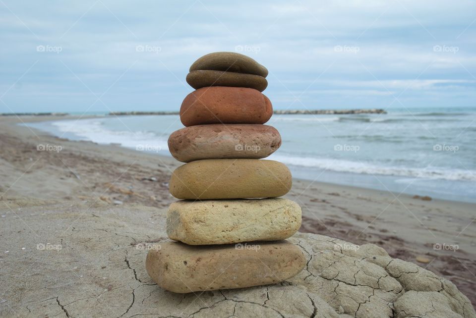 Stones stacked at beach