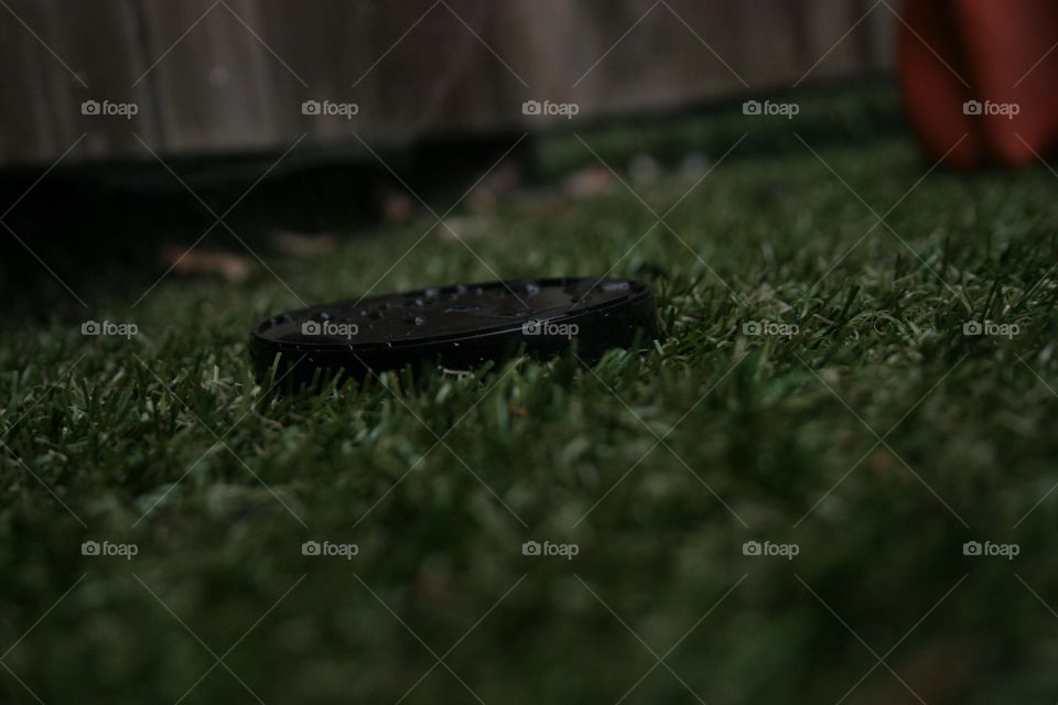 A black circular thing, low iso, shallow depth of field.