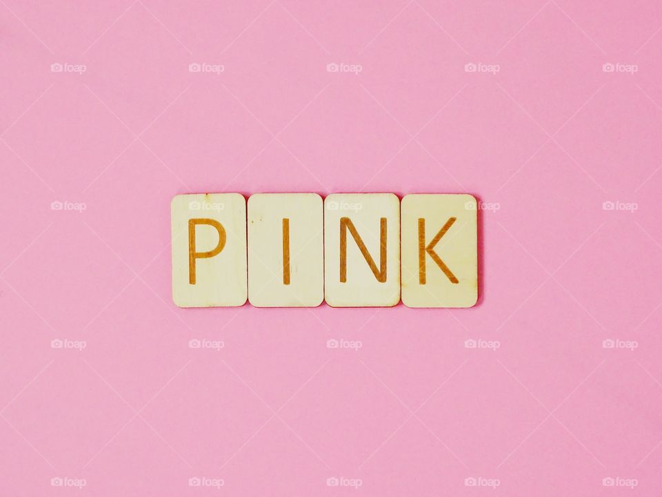 Pink with wooden letters