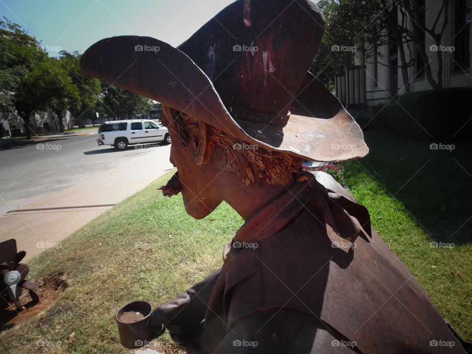 cowboy Bill. This is a picture I took of a steel cowboy that is on display in front of the local library. 👣 🚶 🏃 🔥 💨