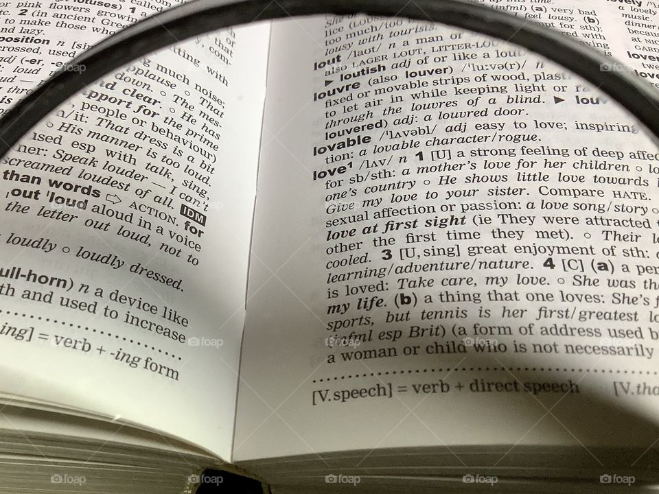 Picture of the word love through a magnifying glass