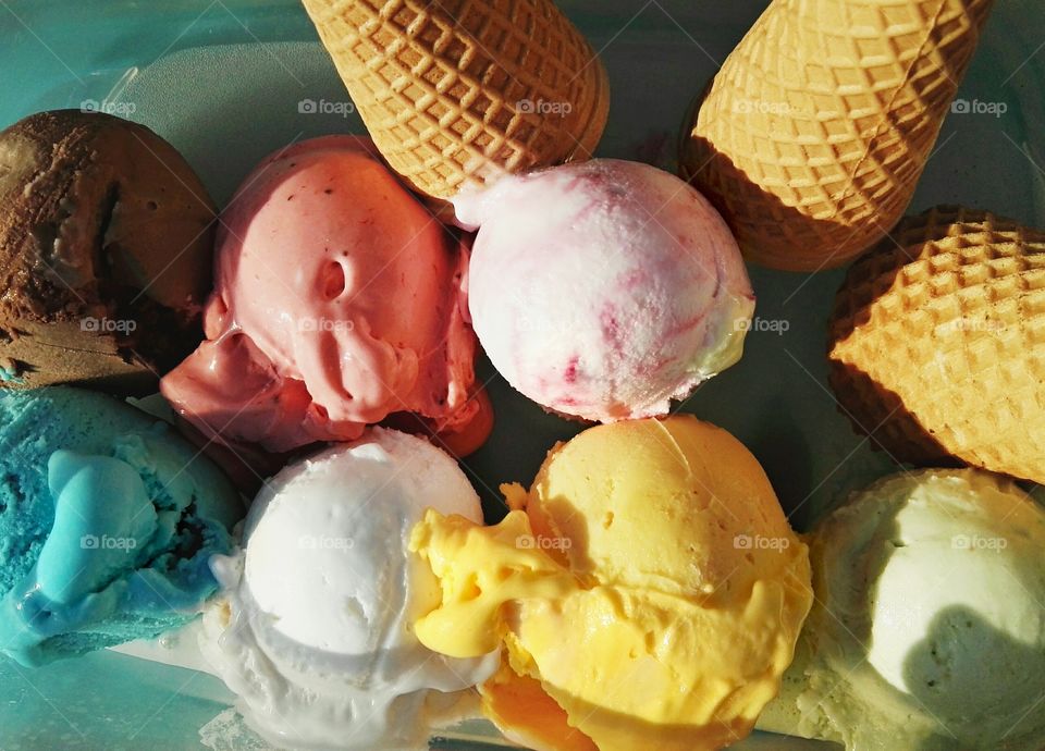 Colorful balls of ice cream and wafers